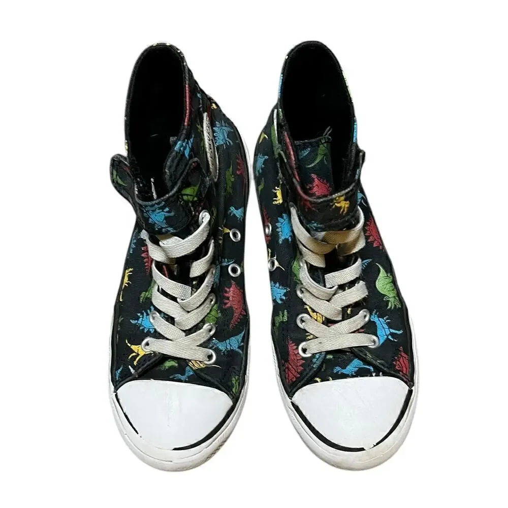 CONVERSE Kids Black hi top dinosaur lace and rip top closure. Pre owned size 3